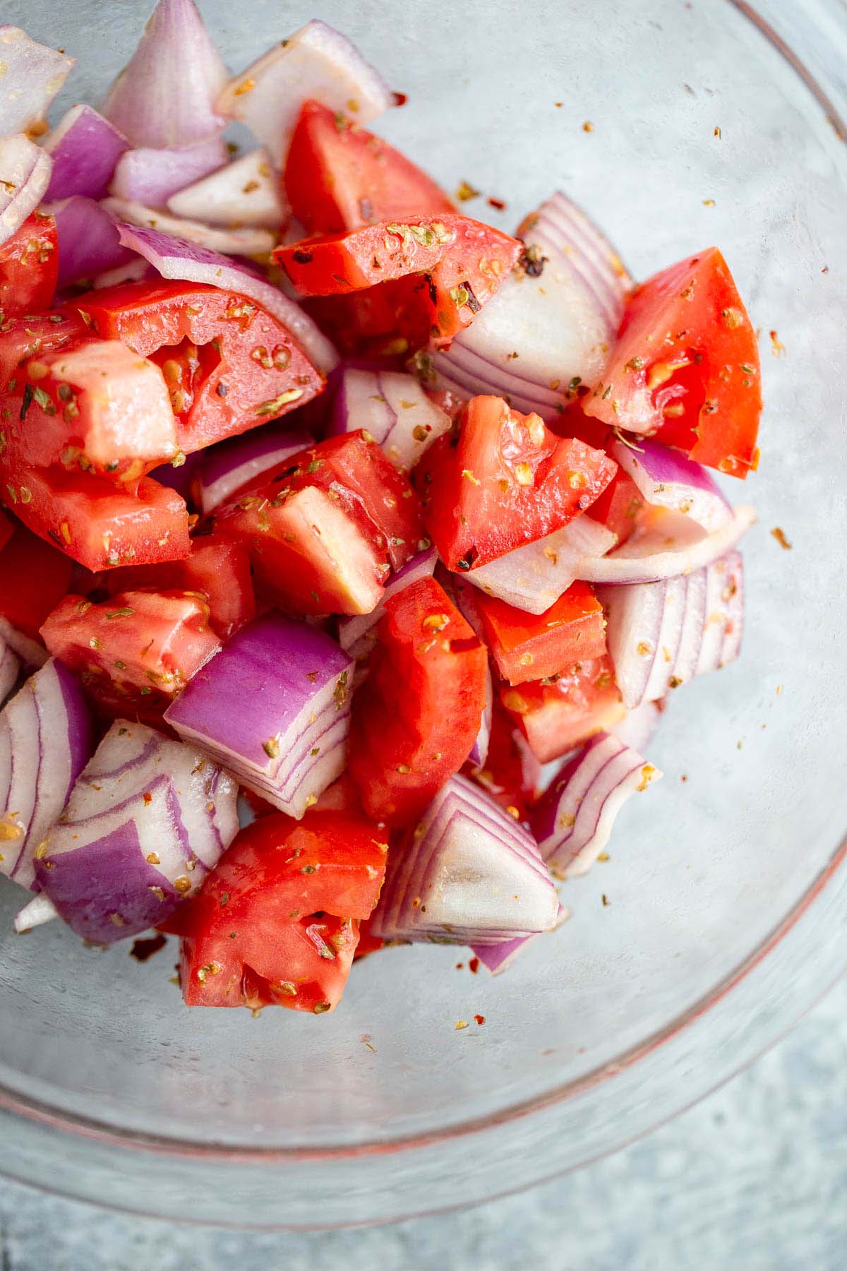 Tomatoes and onions mixed together with spices.