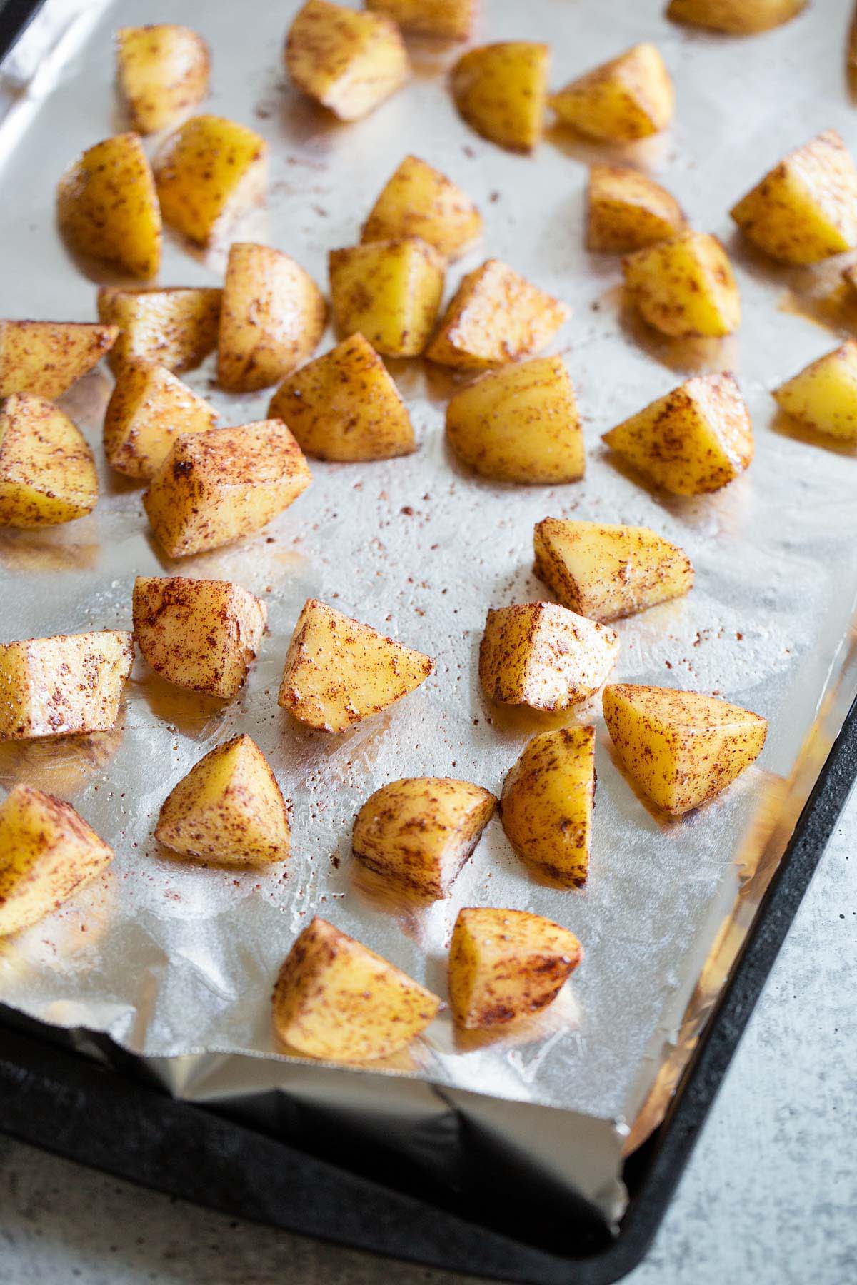 Potatoes on a baking sheet.