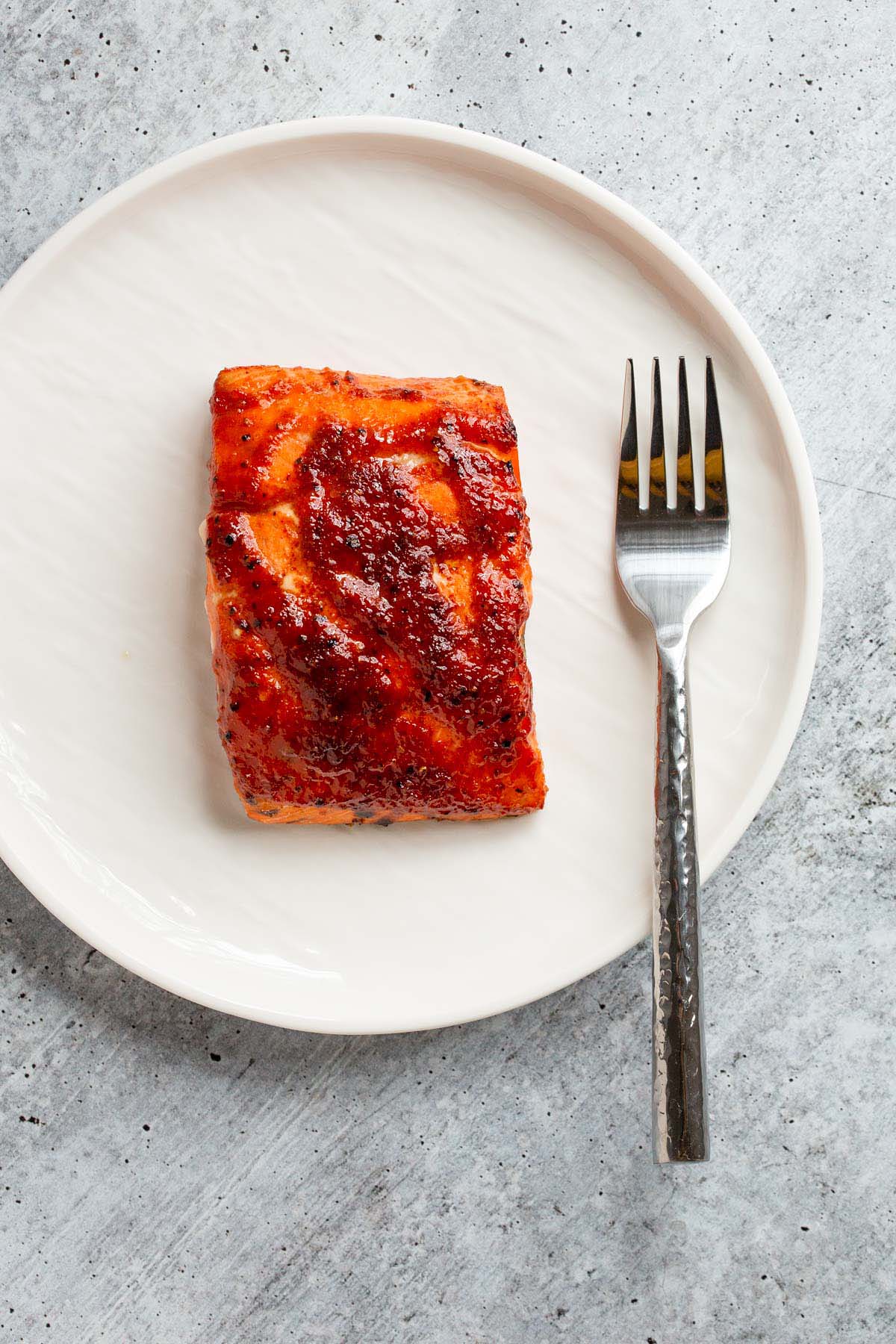 Air fryer bbq salmon on a plate.