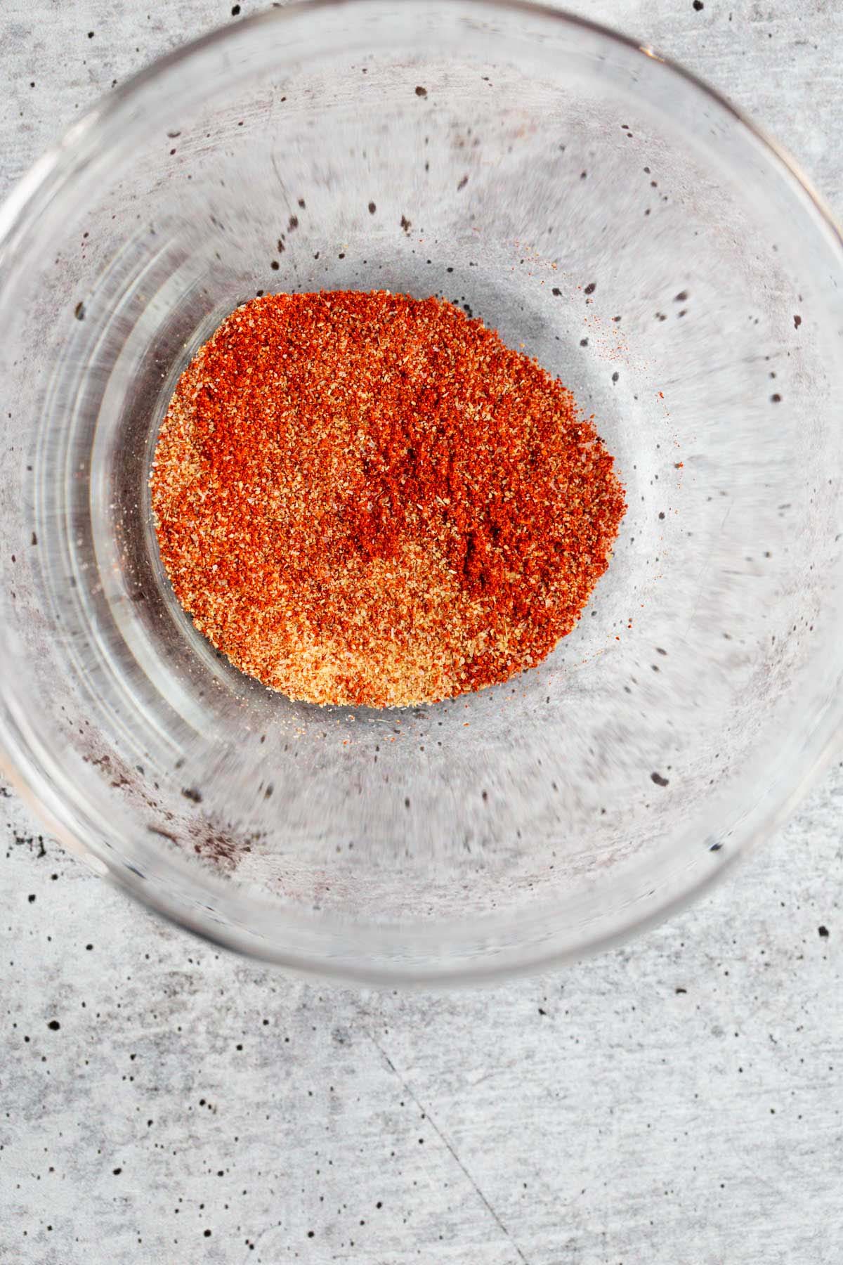 Seasonings tossed together in a bowl.