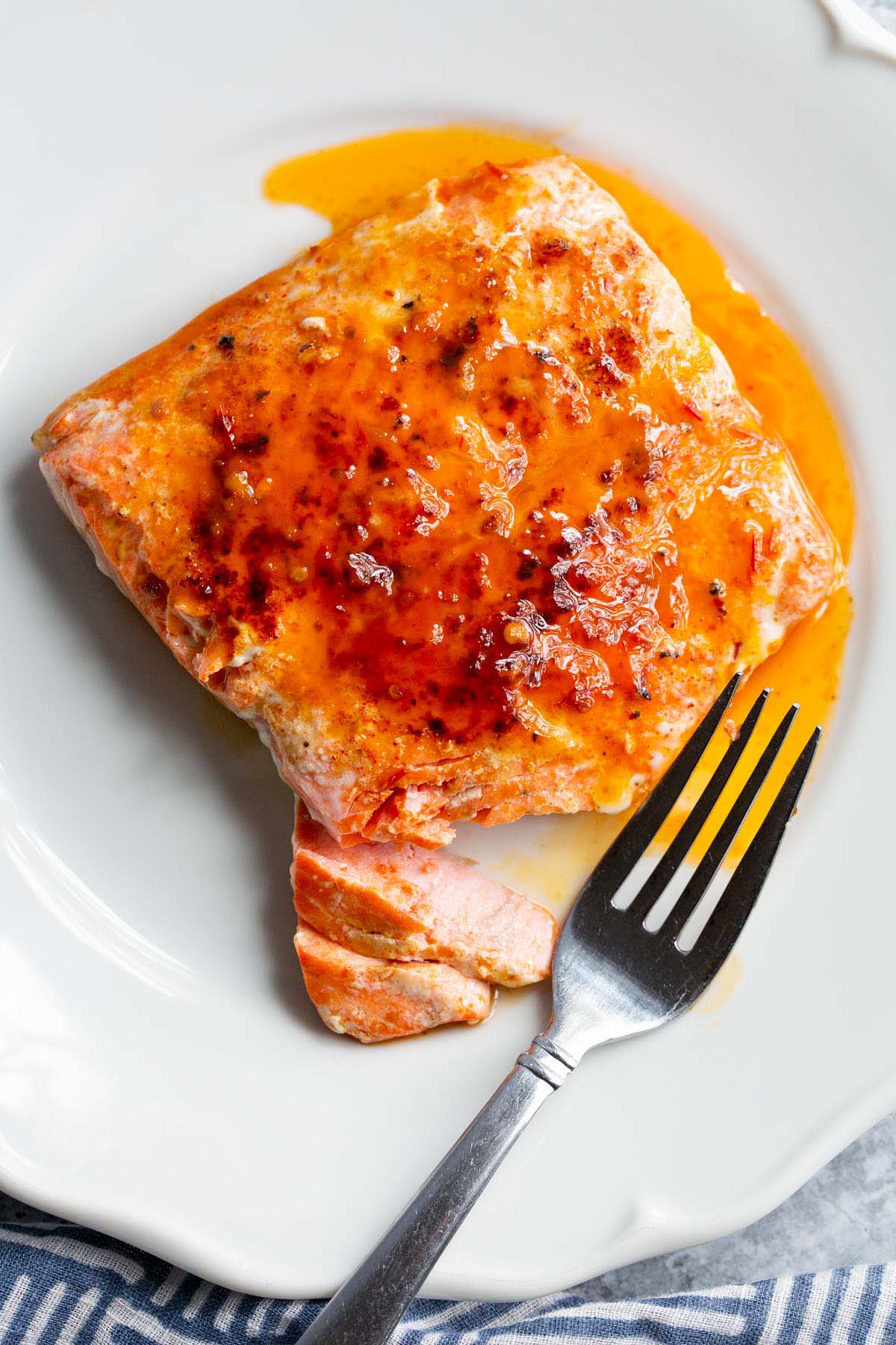 Peri Peri Salmon on a white plate.