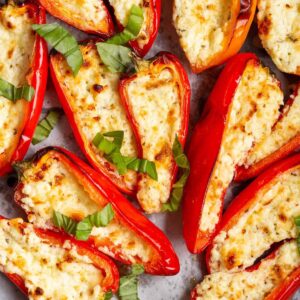 Feta stuffed mini peppers topped with basil.