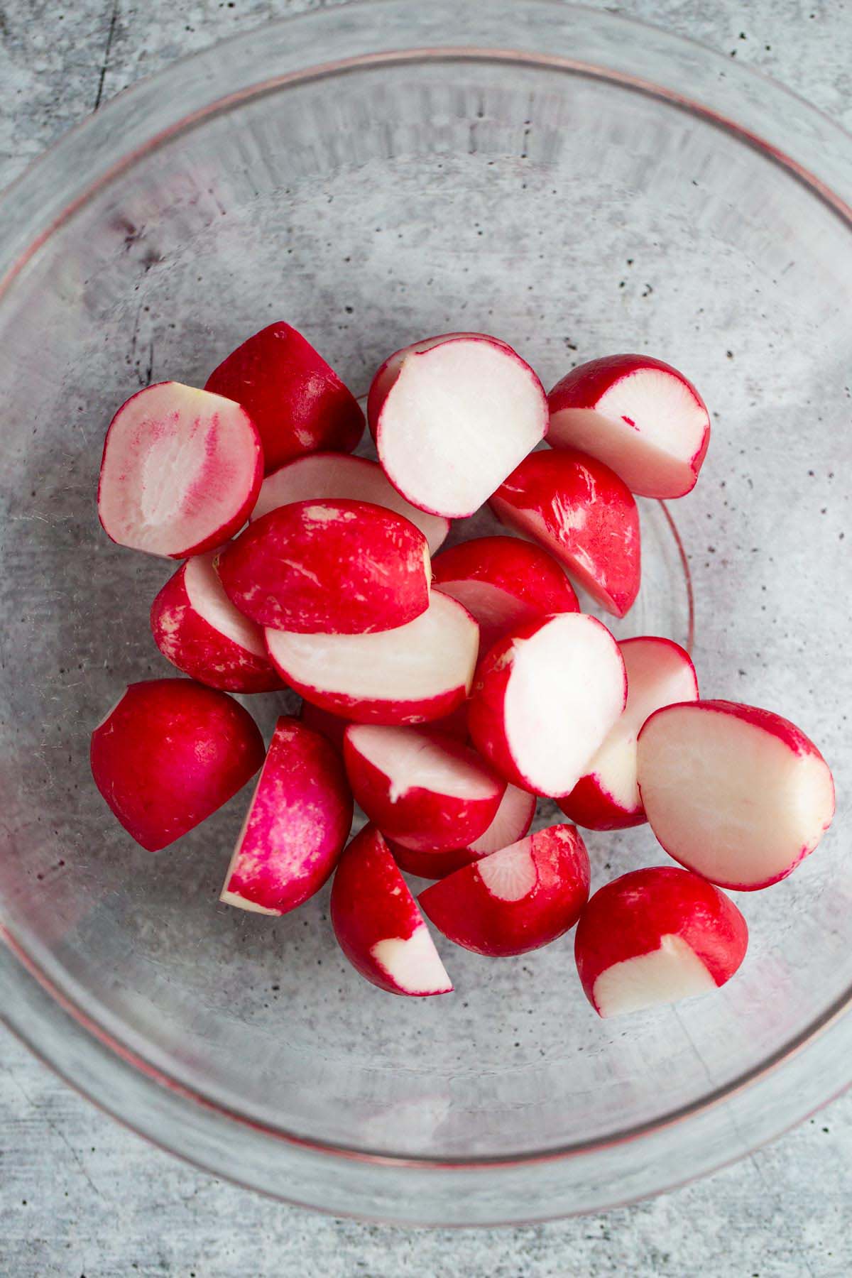 Cut radishes in a bowl.