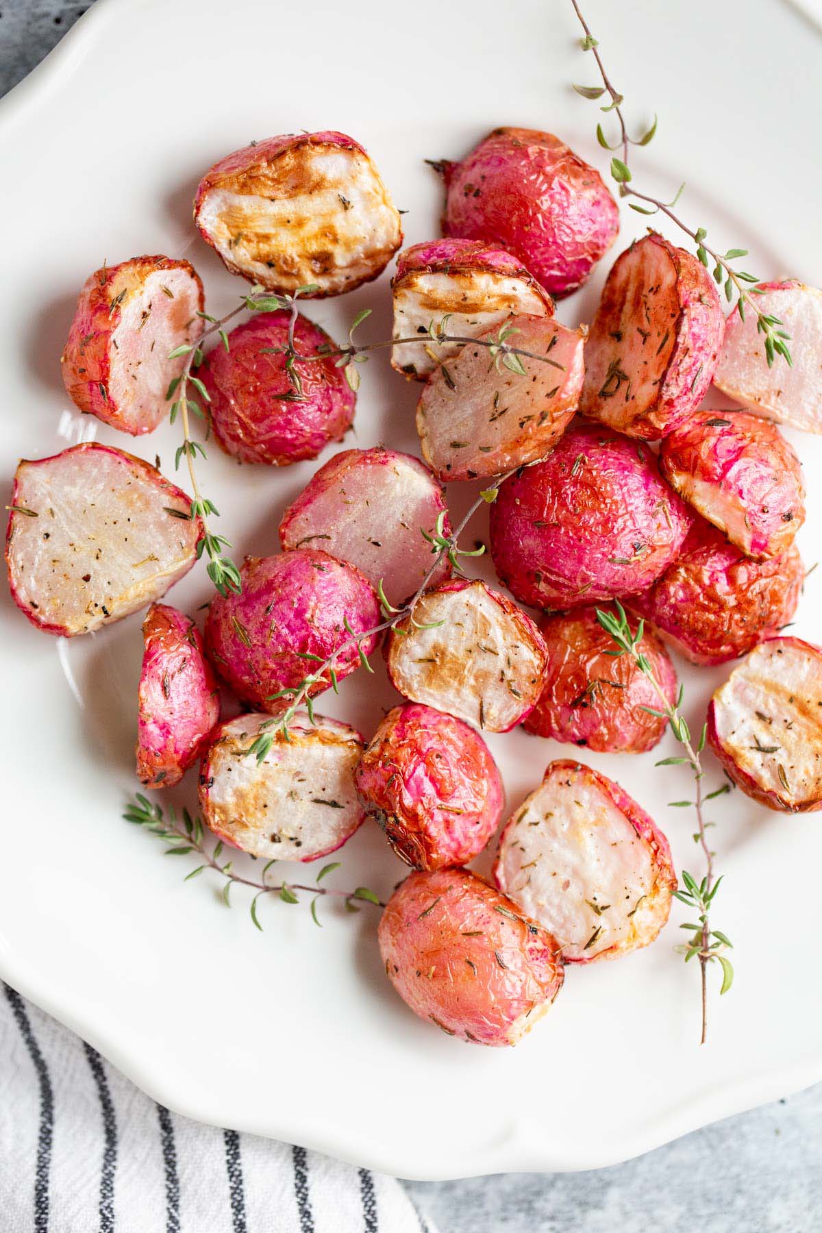 Air fried radishes on a white plate.