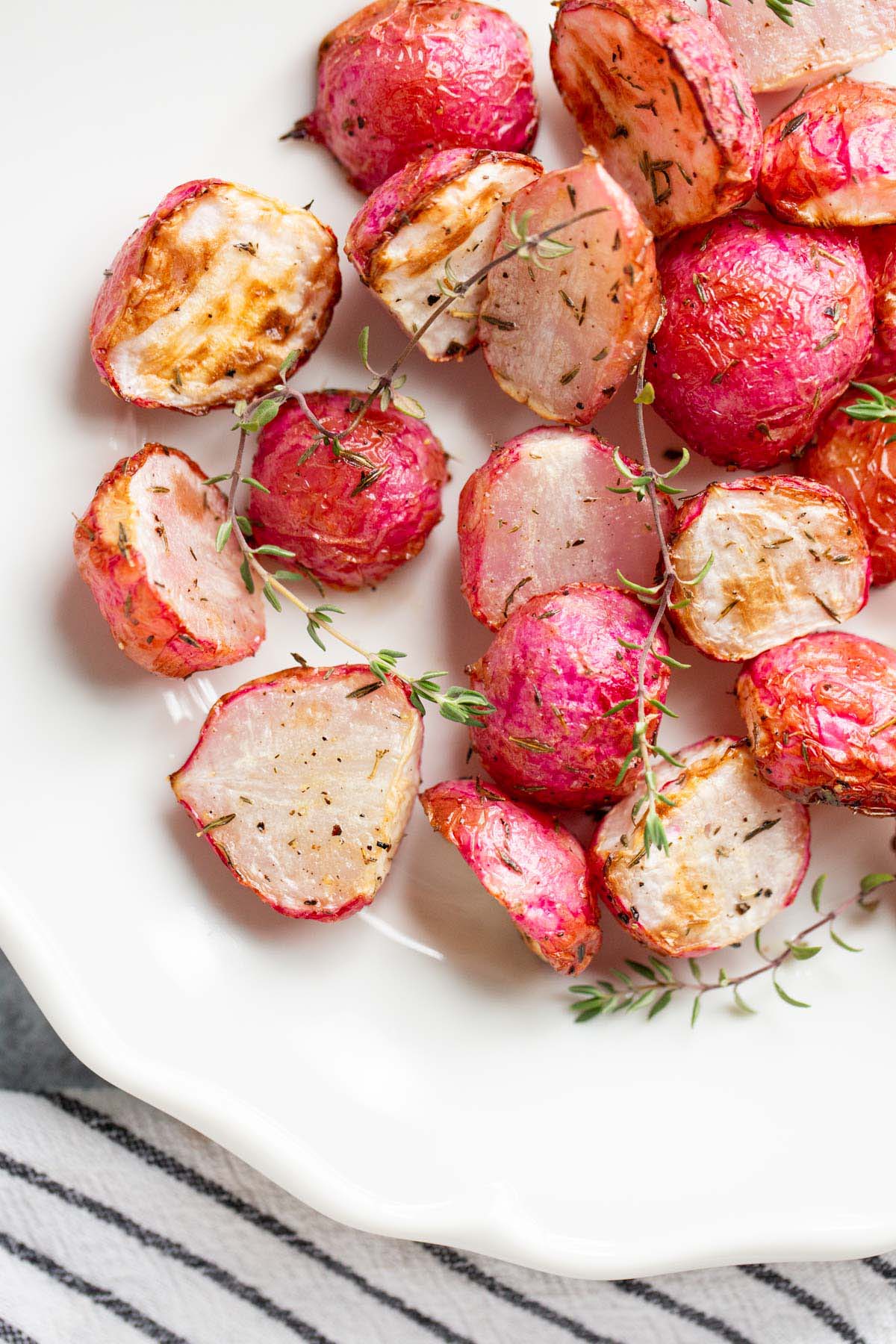 Air fried radishes on a white plate.