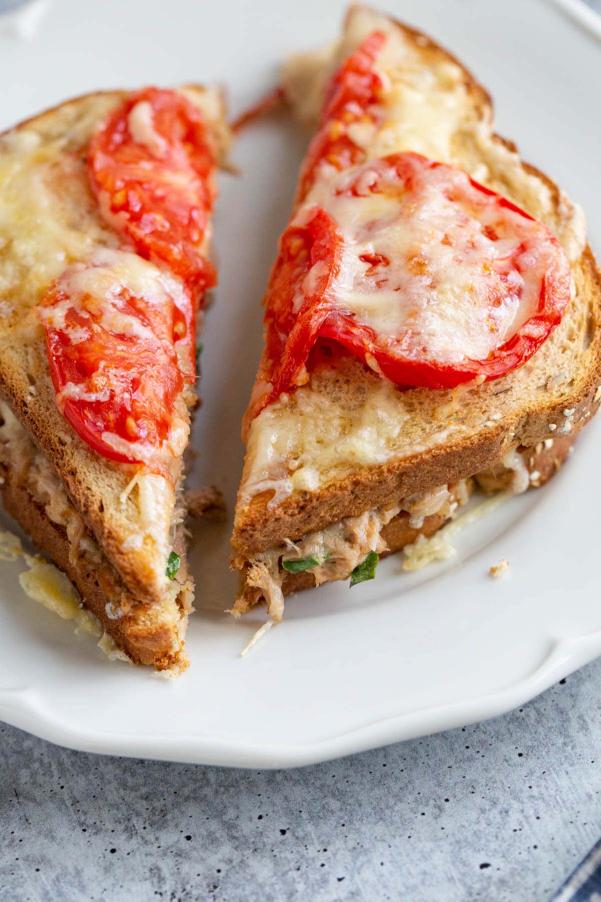 Air fryer tuna melt on a white plate.