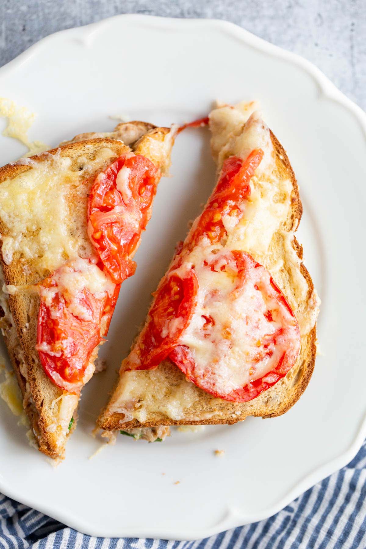 Air fryer tuna melt on a white plate.