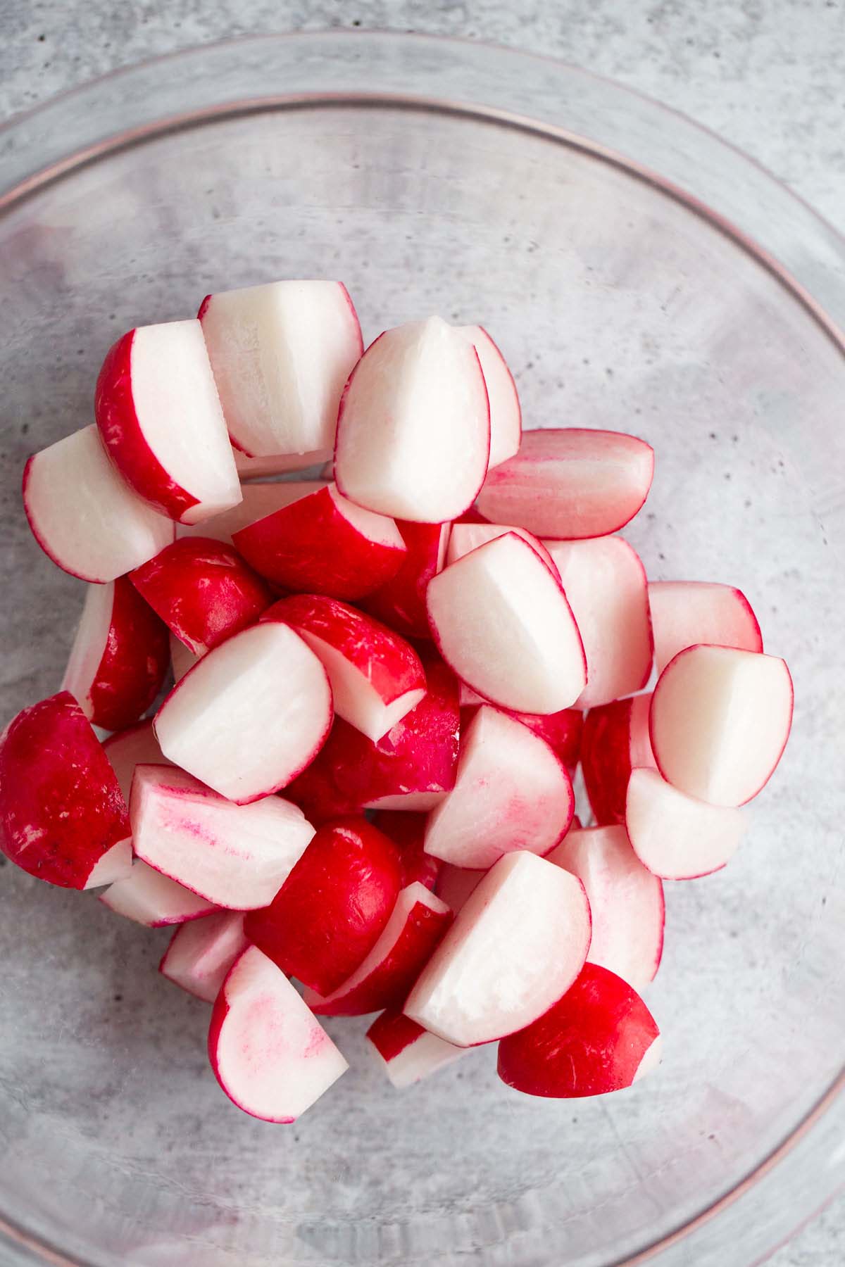 Diced radishes in a bowl.