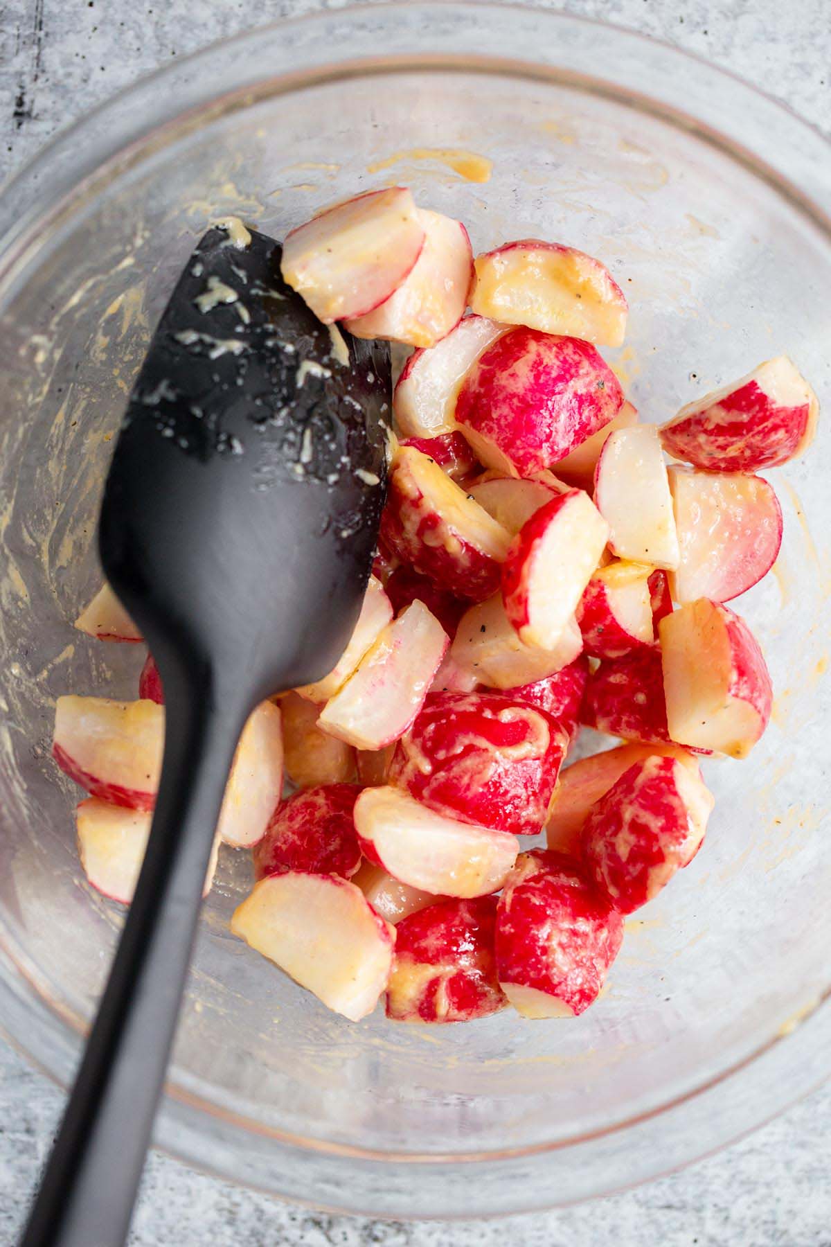 Radishes tossed in miso.