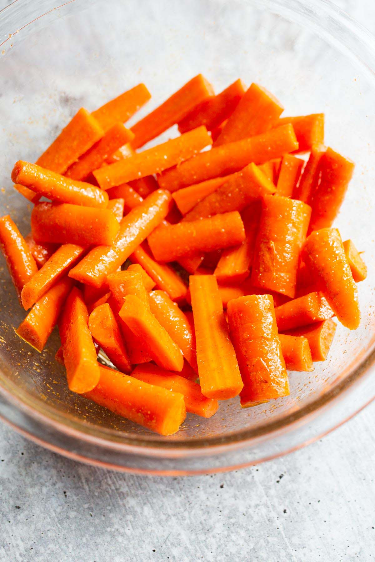 Uncooked carrots in a bowl.