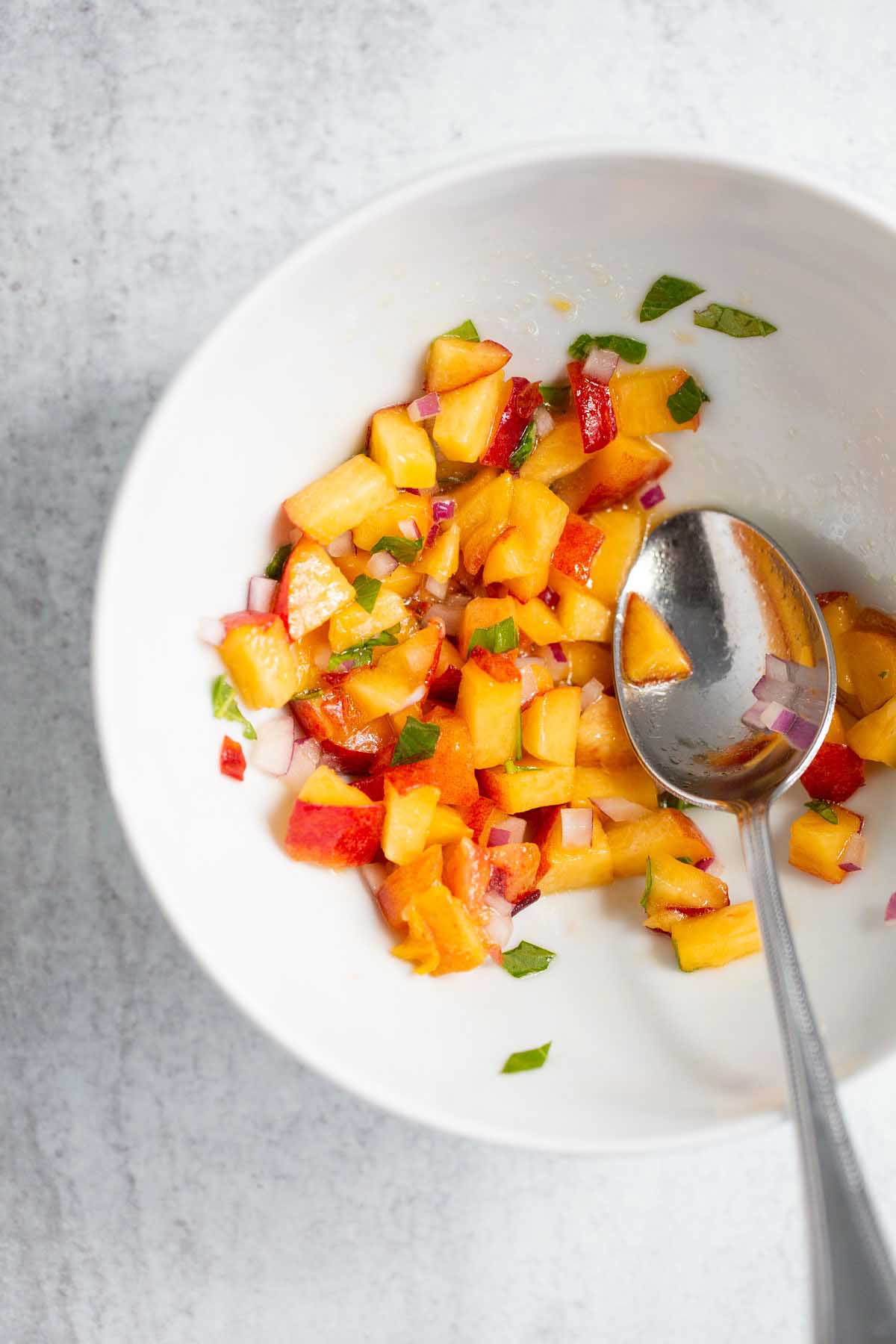 Peach salsa in a bowl.