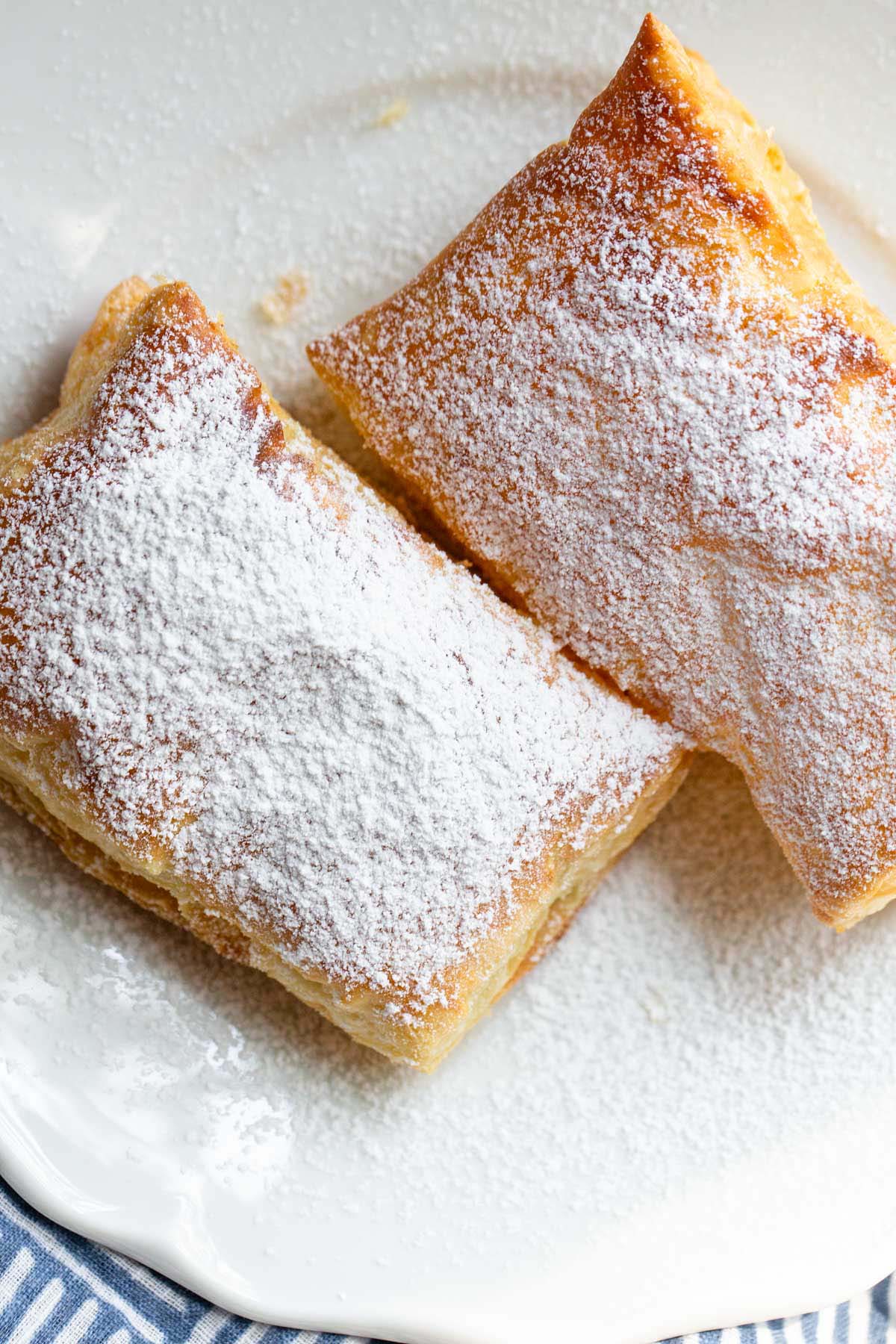 Air fried puff pastry with powdered sugar.