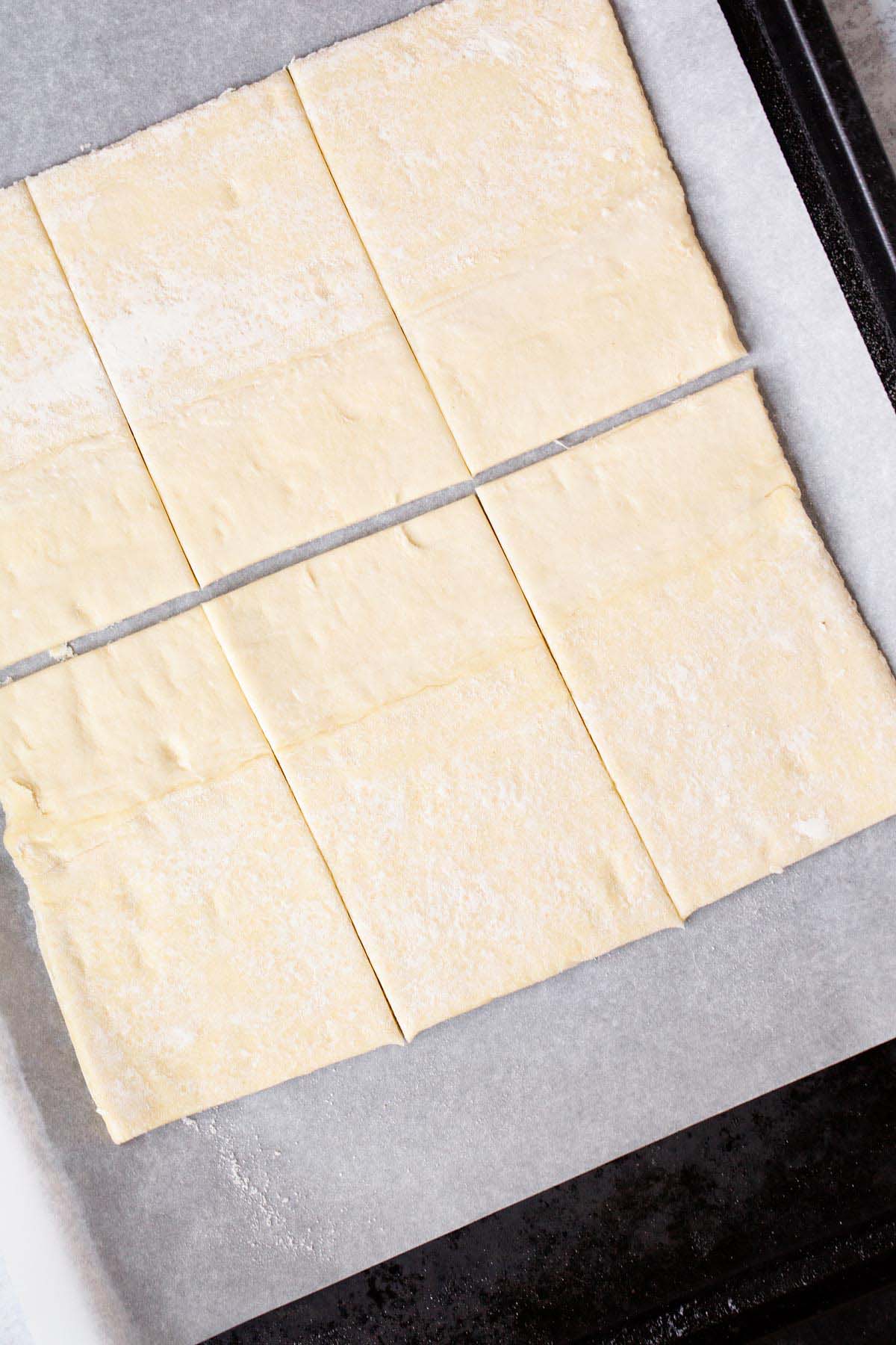 Puff pastry sheet cut into six rectangles.