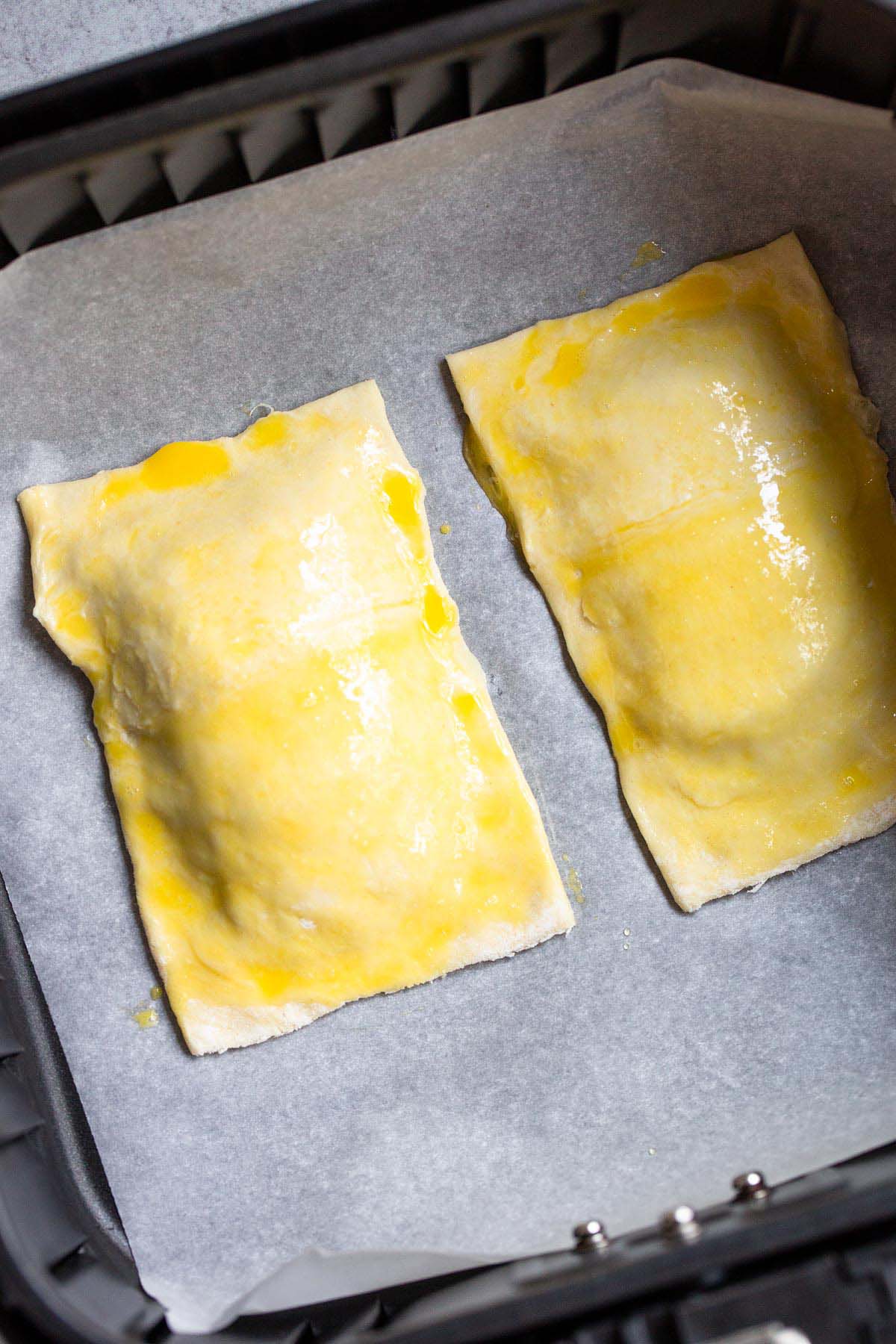 Puff pastry sheets with egg wash.