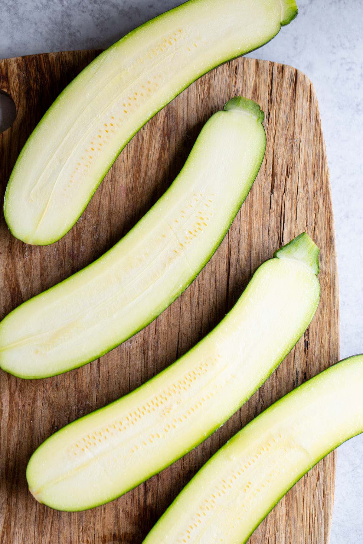 Zucchini sliced in half.