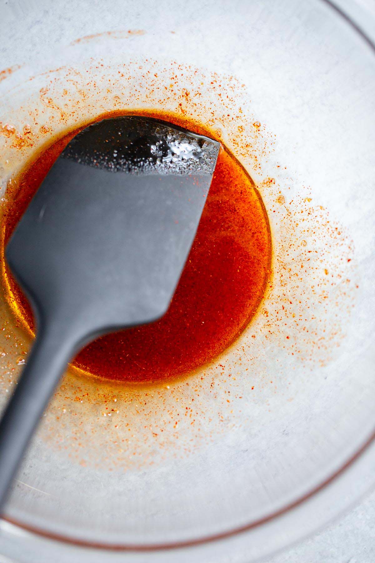 Salmon marinate in a bowl.