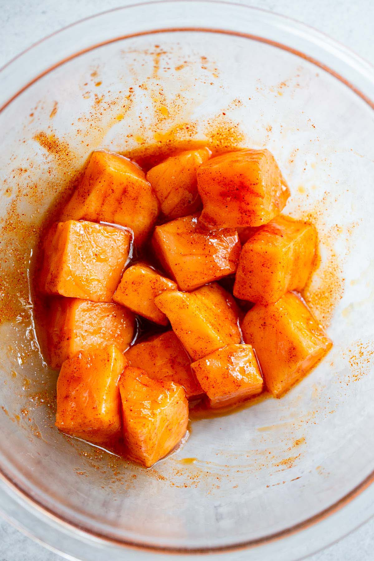 Salmon cubes in a bowl.