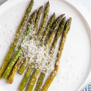 Air fried asparagus topped with parmesan cheese.