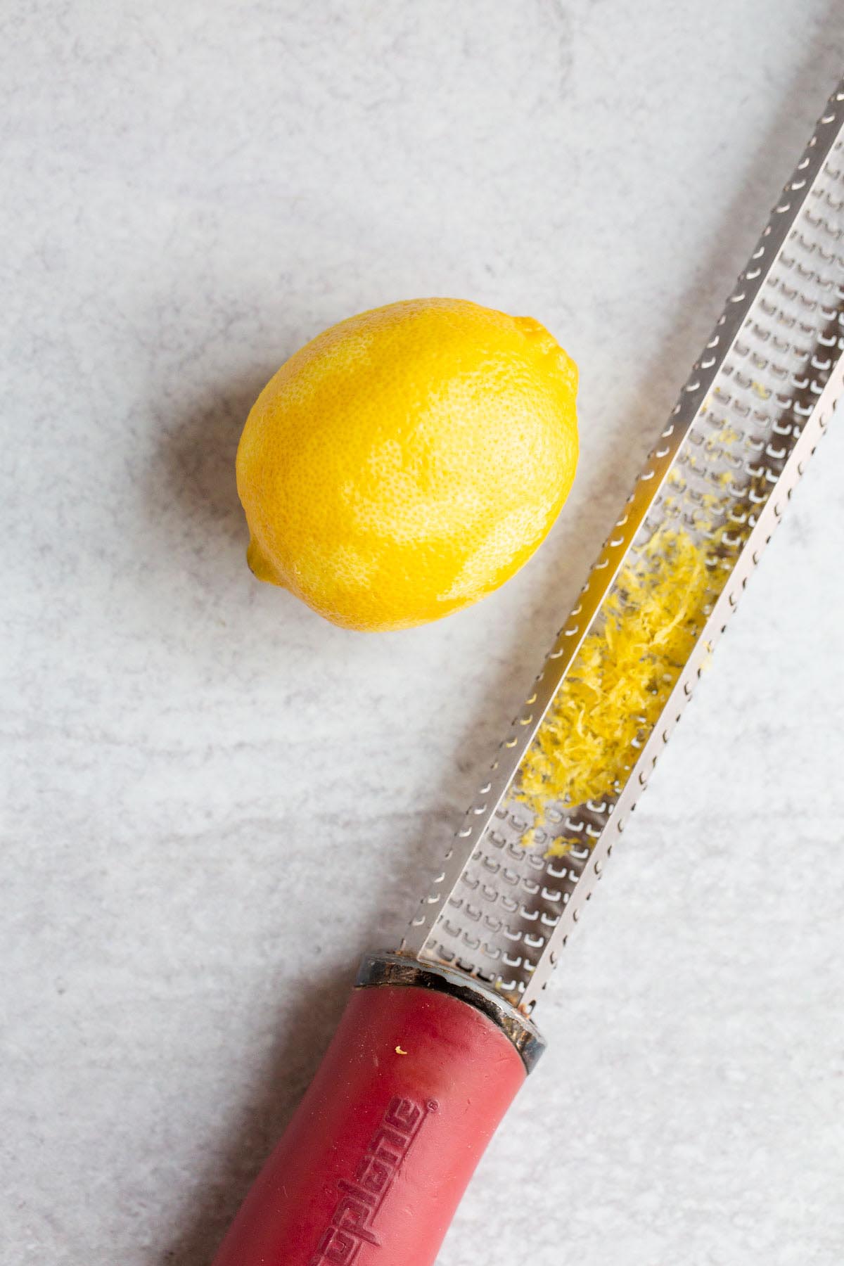 Zesting a lemon.