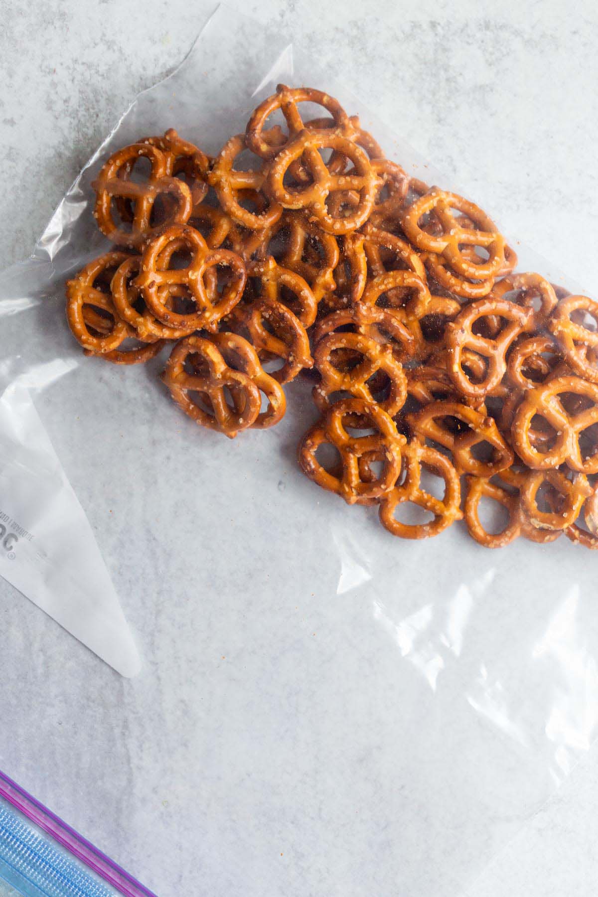 Pretzel pieces in a plastic bag.