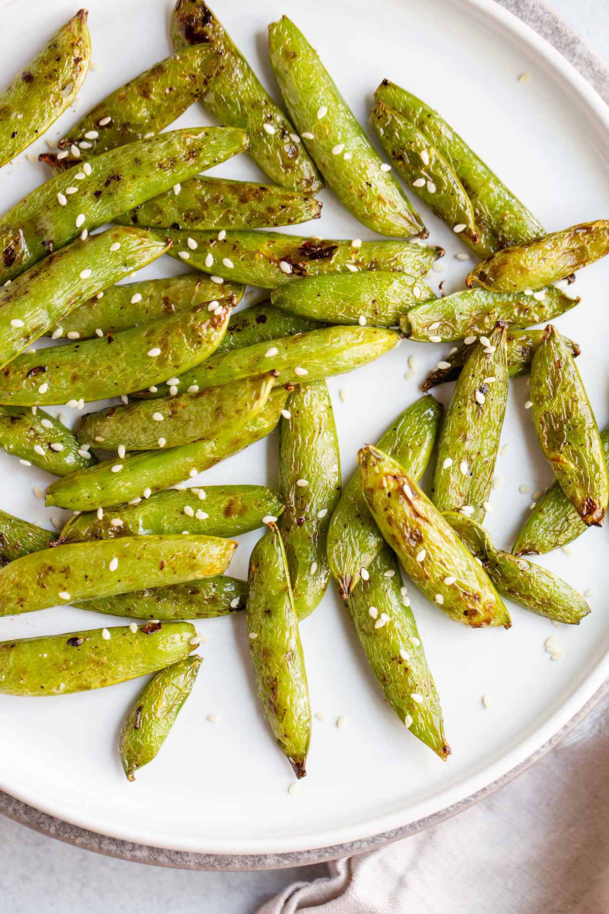 Air fried snap peas with sesame seeds.