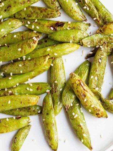 Air fried snap peas with sesame seeds.