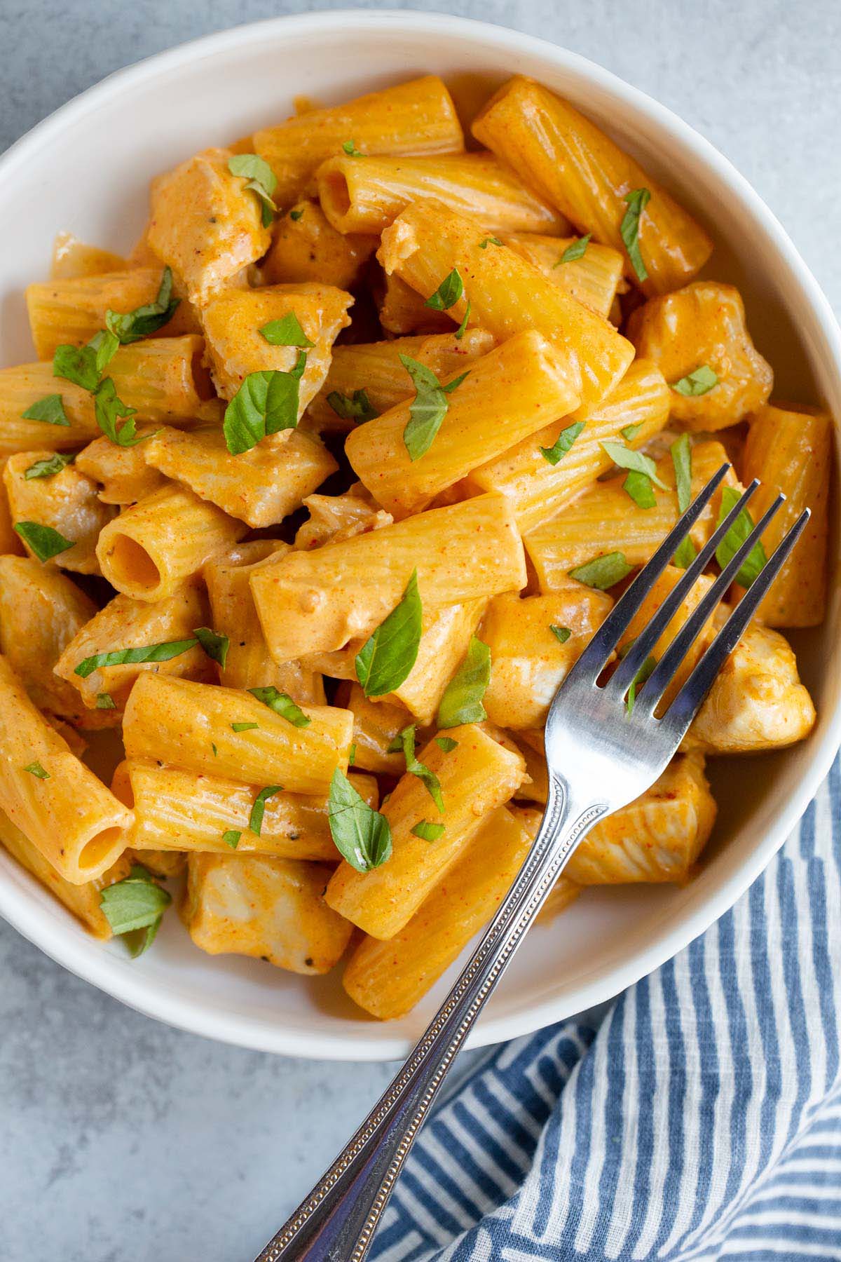 Peri peri pasta in a bowl with a fork