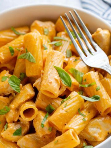 Peri peri pasta in a bowl with a fork