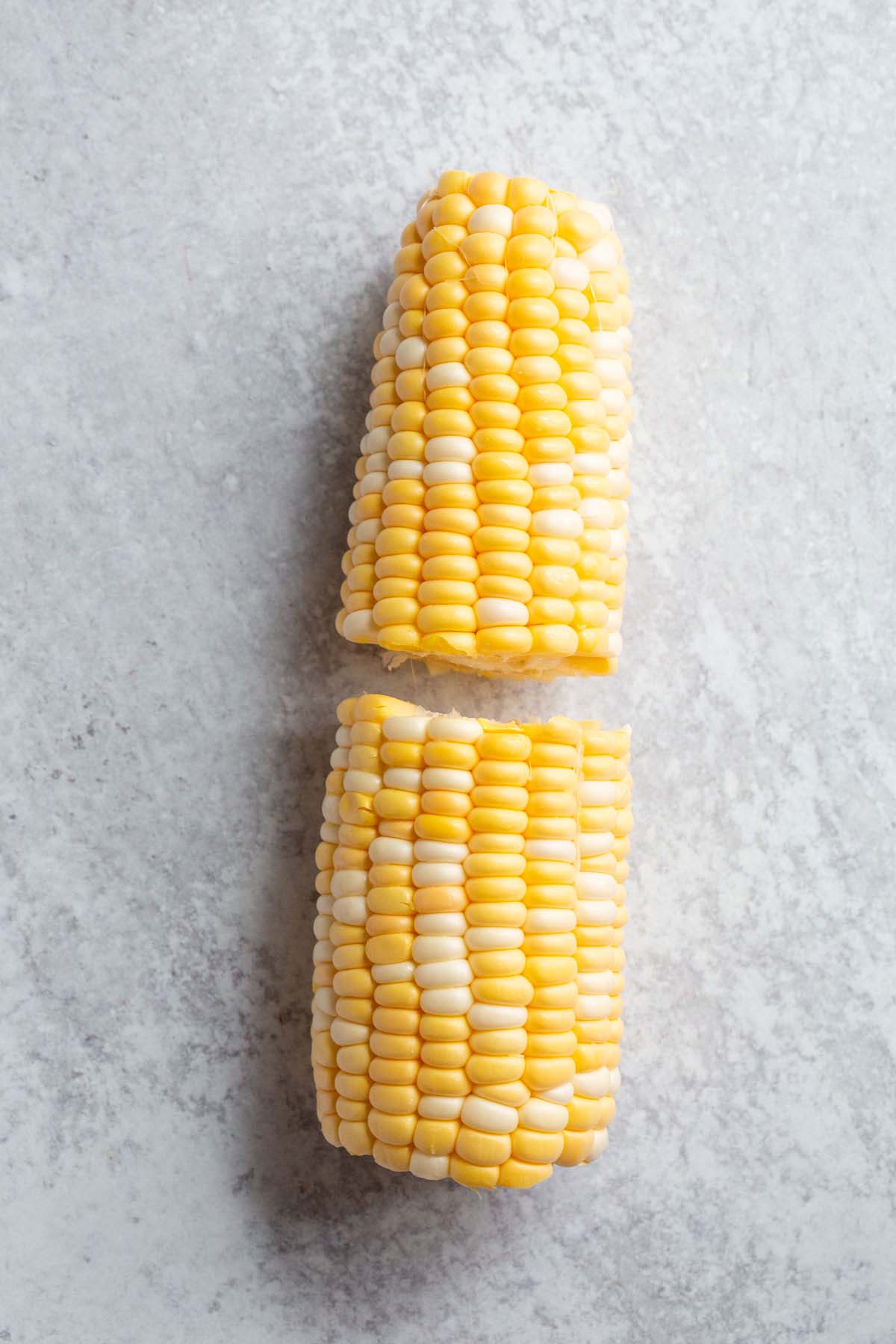 Corn cut in half.