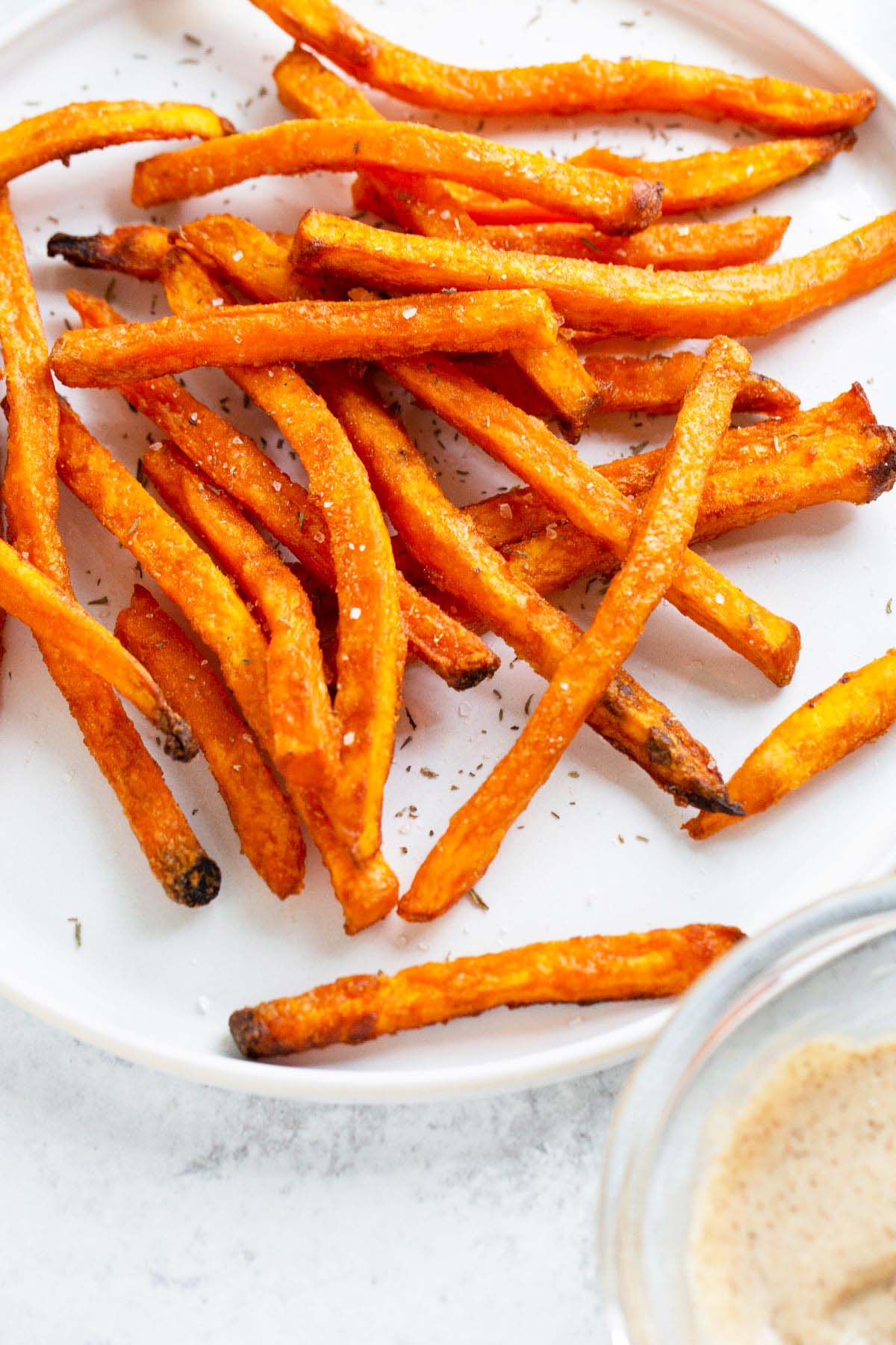 Sweet potato fries on a plate.