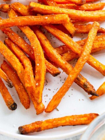 Sweet potato fries on a plate.