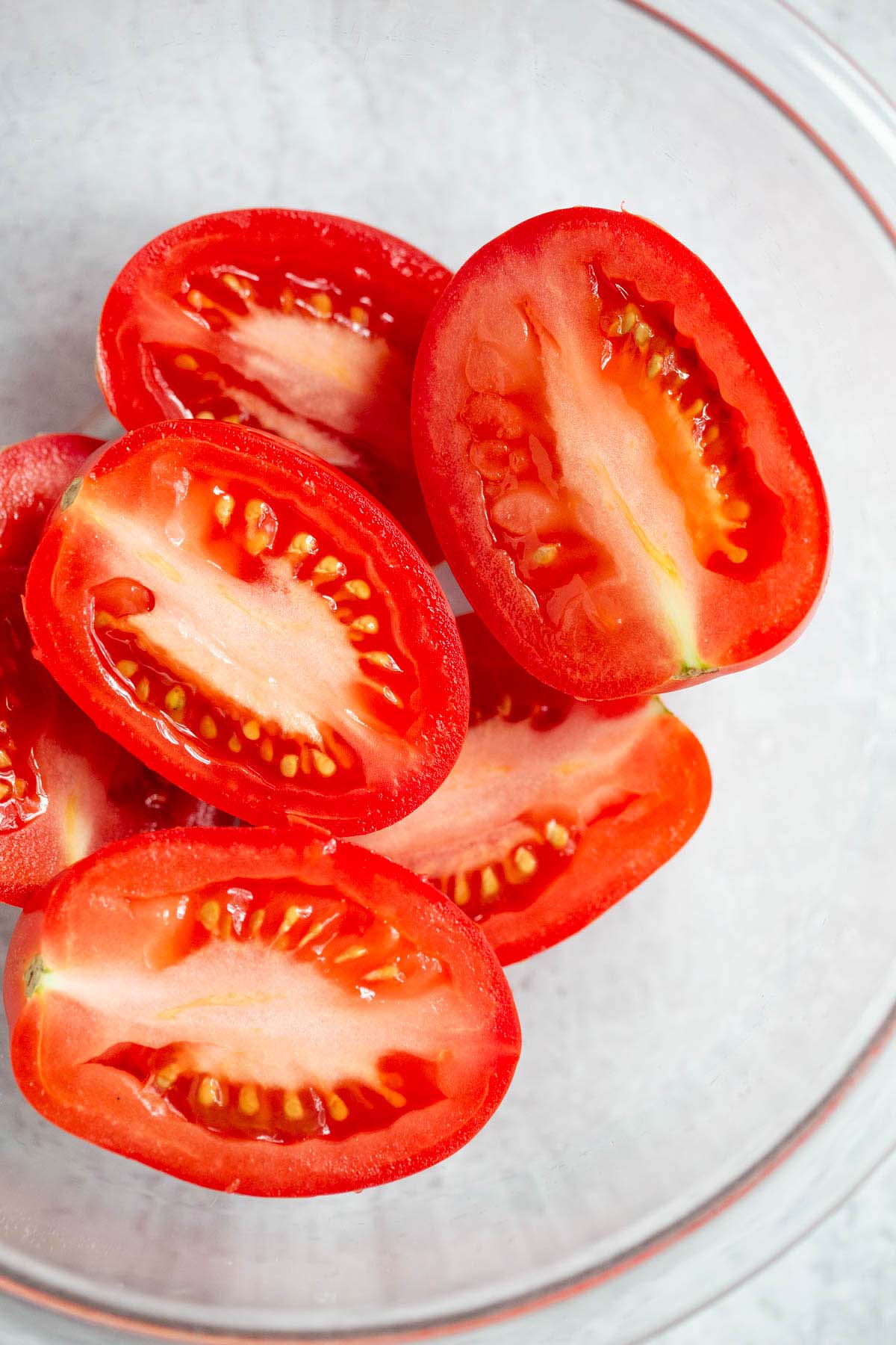 Sliced roma tomatoes in a bowl