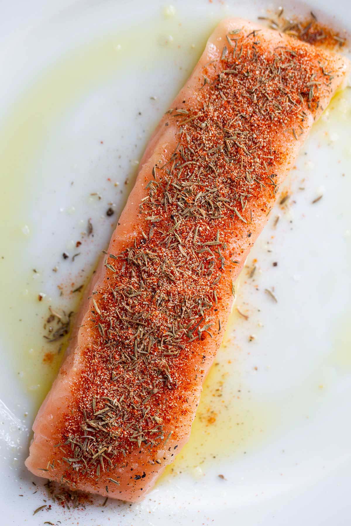 Uncooked salmon with spices.
