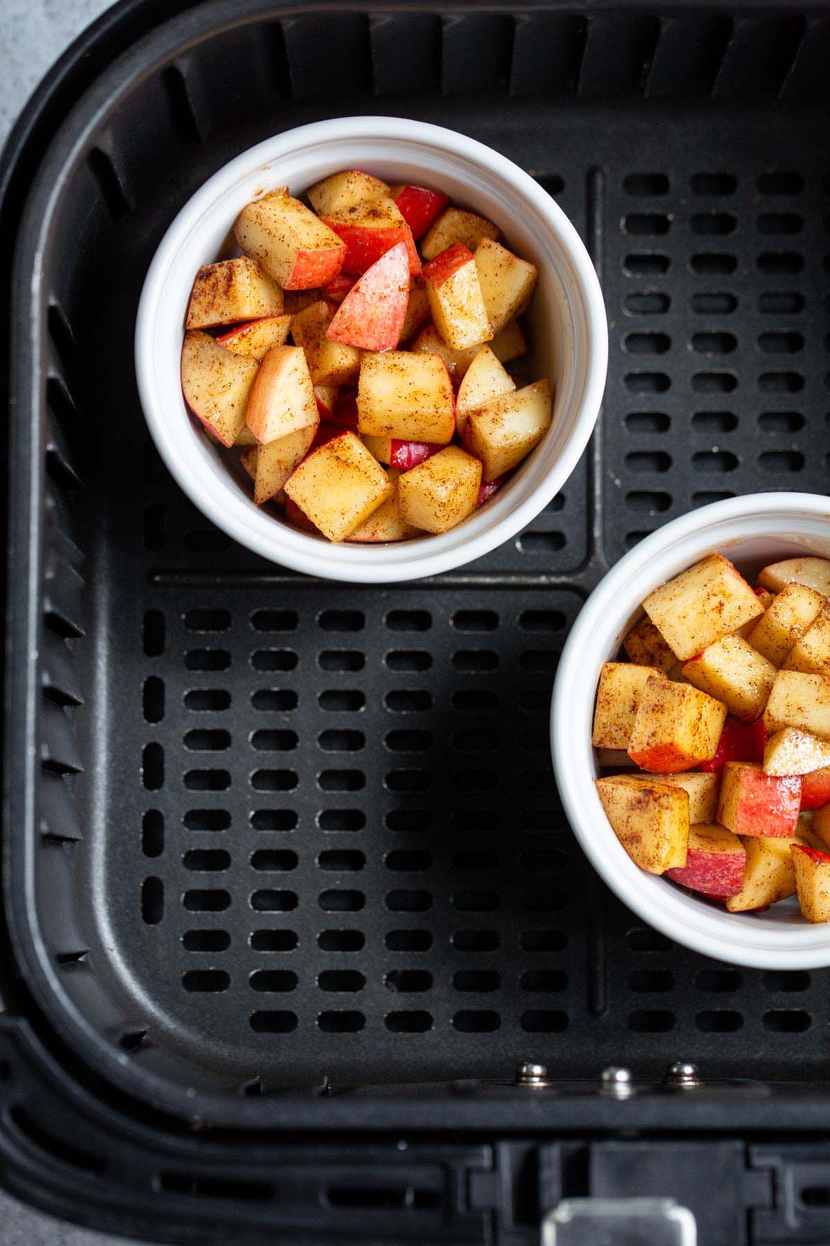 Apples in ramekins in air fryer.