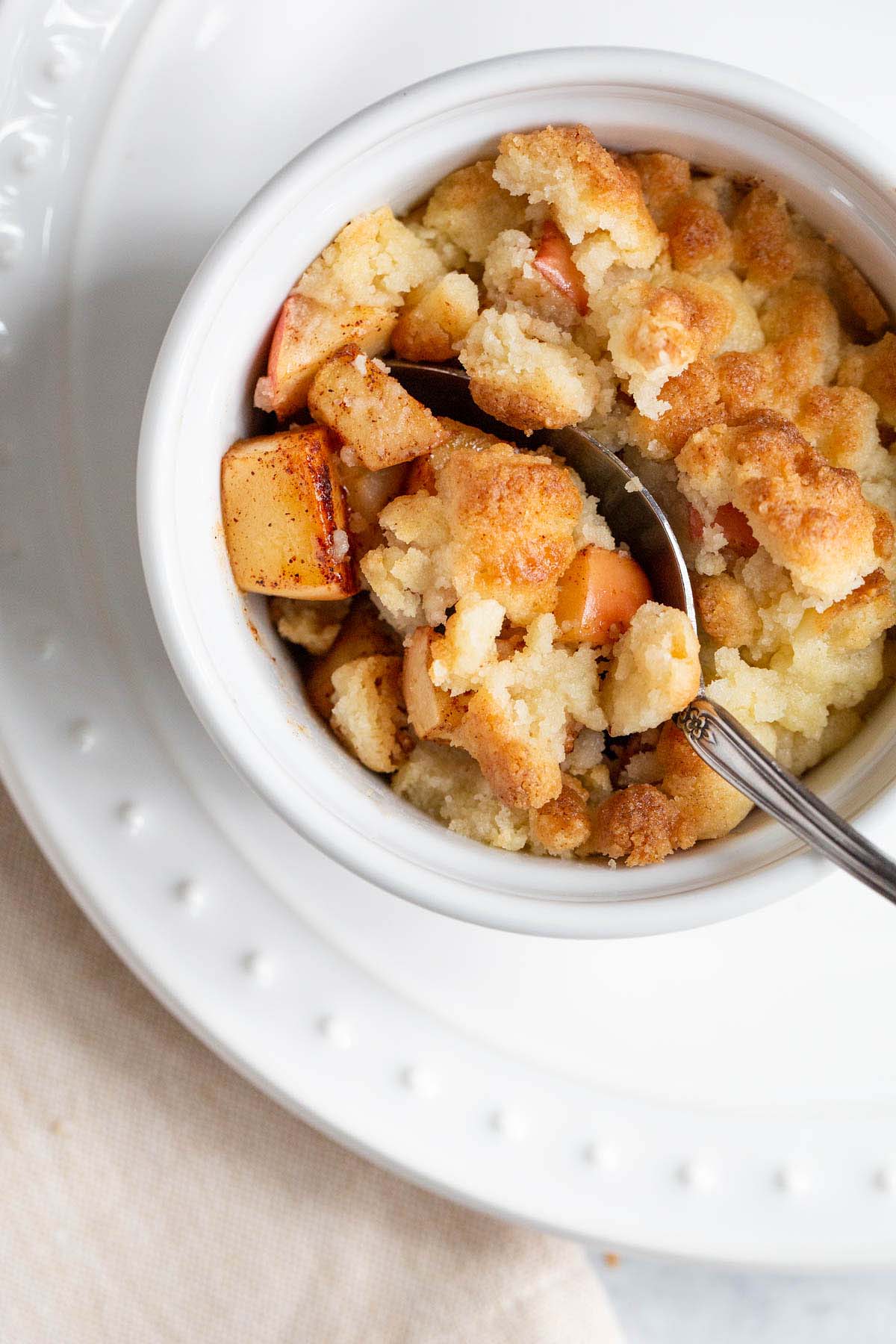 Air fryer apple cobbler in a ramekin.