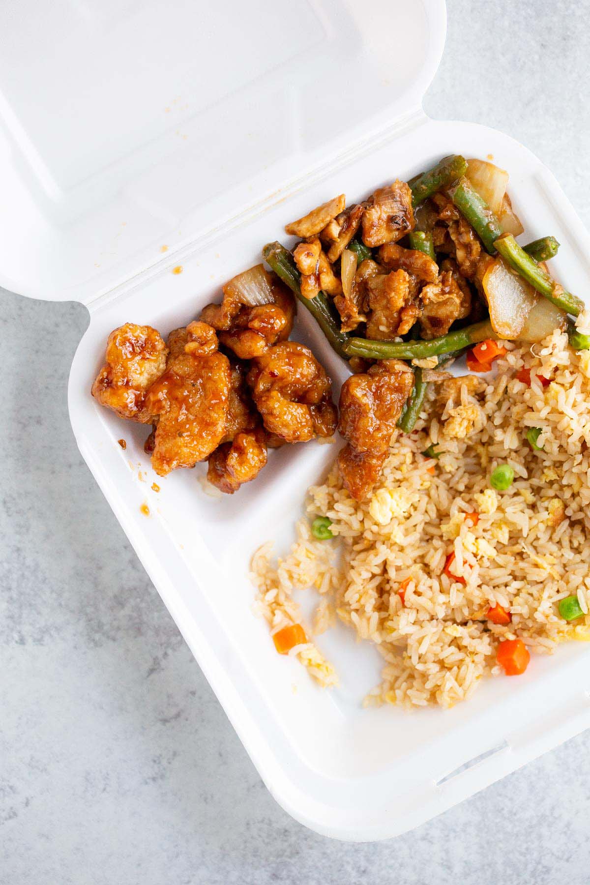 Panda Express leftovers in styrofoam container.