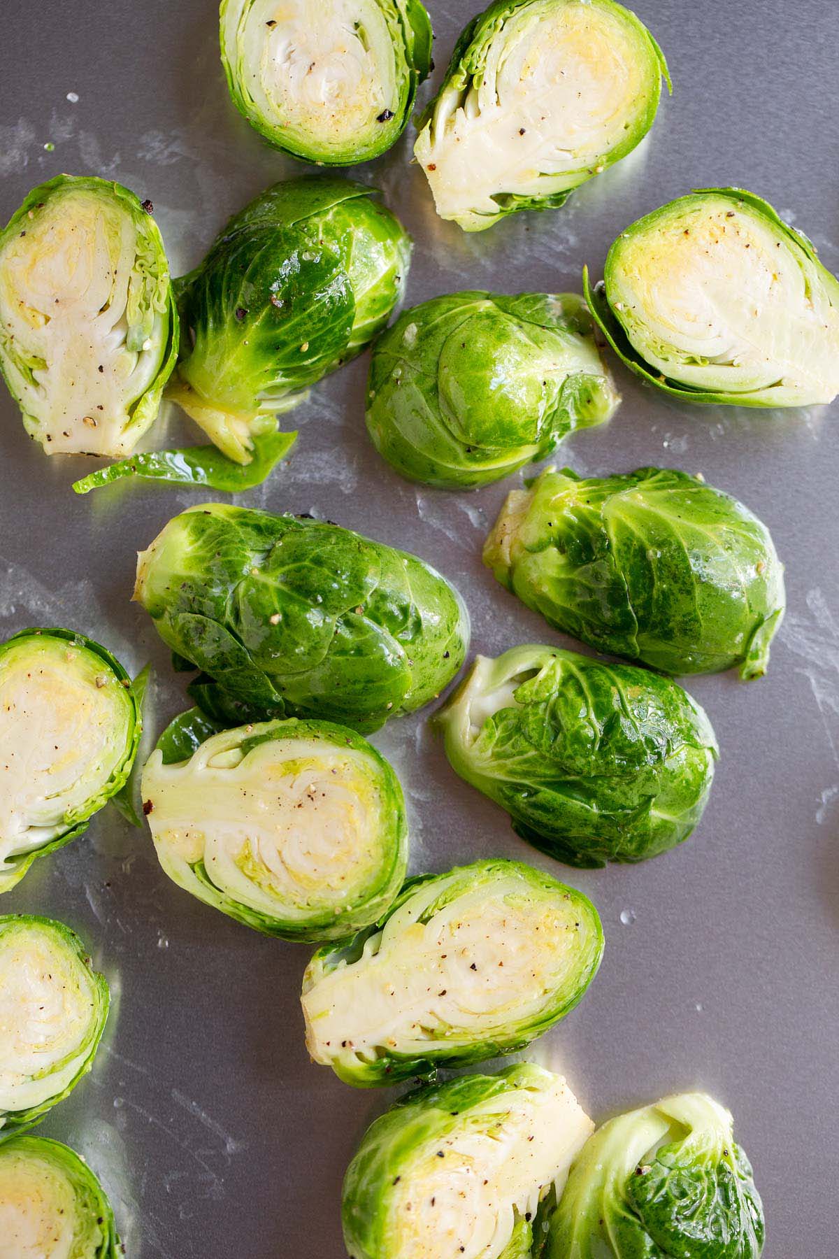 Brussels sprouts on a baking sheet.