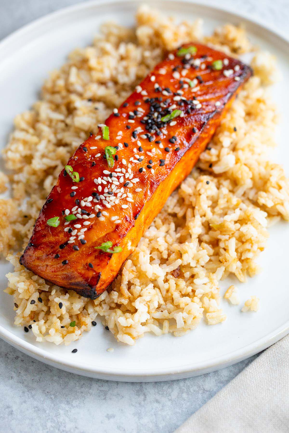 Air fried gochujang salmon on top of rice.