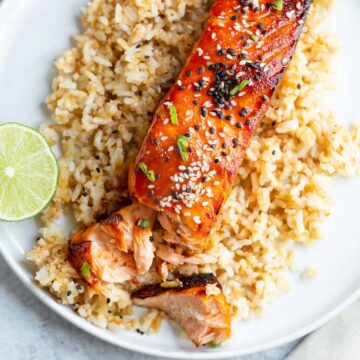 Air fried gochujang salmon on top of rice.