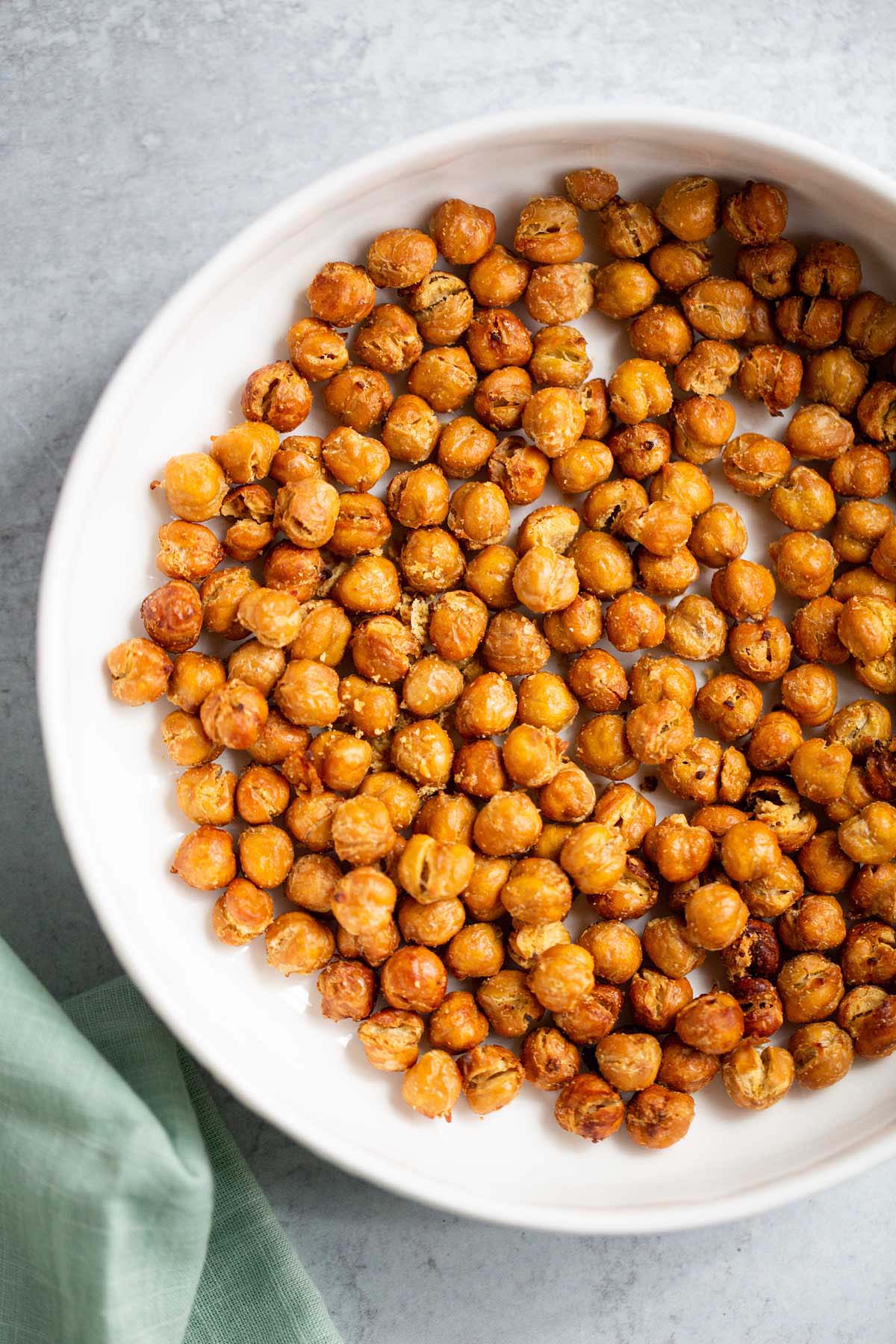 Crispy air fried chickpeas in a white bowl.