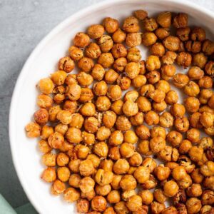 Crispy air fried chickpeas in a white bowl.