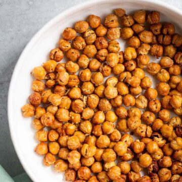 Crispy air fried chickpeas in a white bowl.