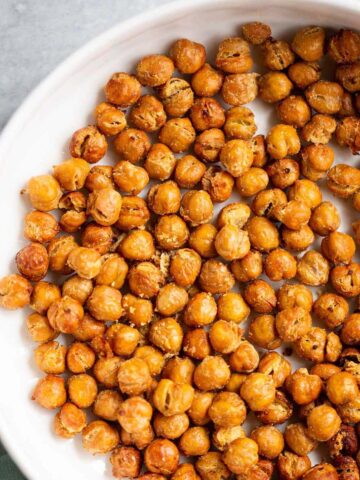 Crispy air fried chickpeas in a white bowl.