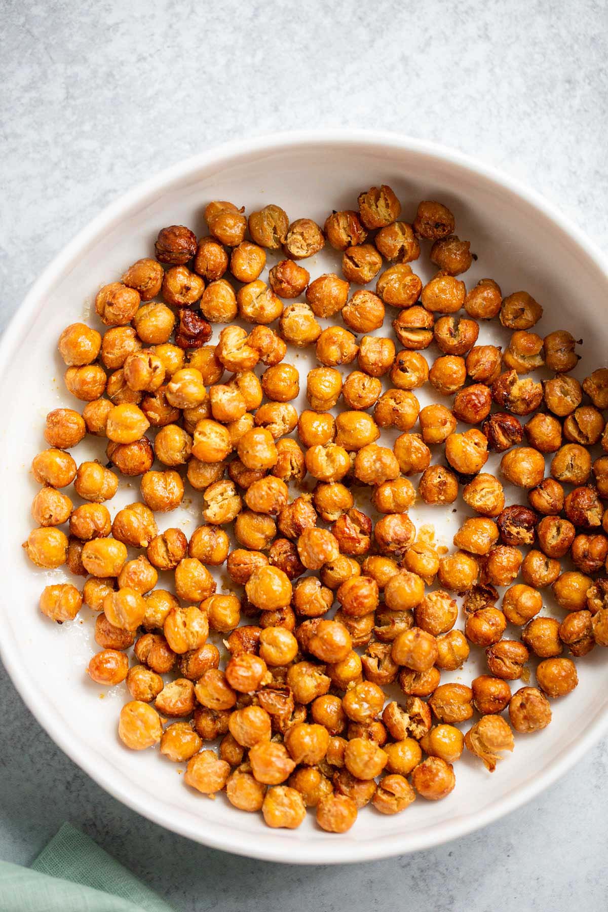 Crispy air fried chickpeas in a white bowl.