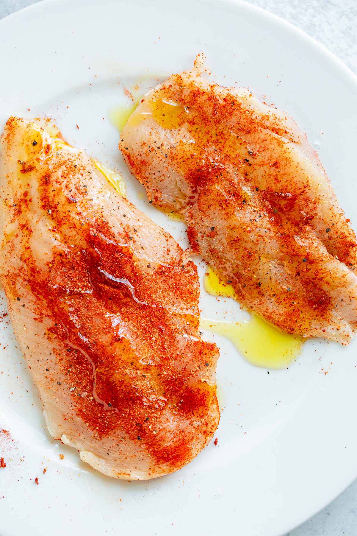 Chicken breasts with olive oil.