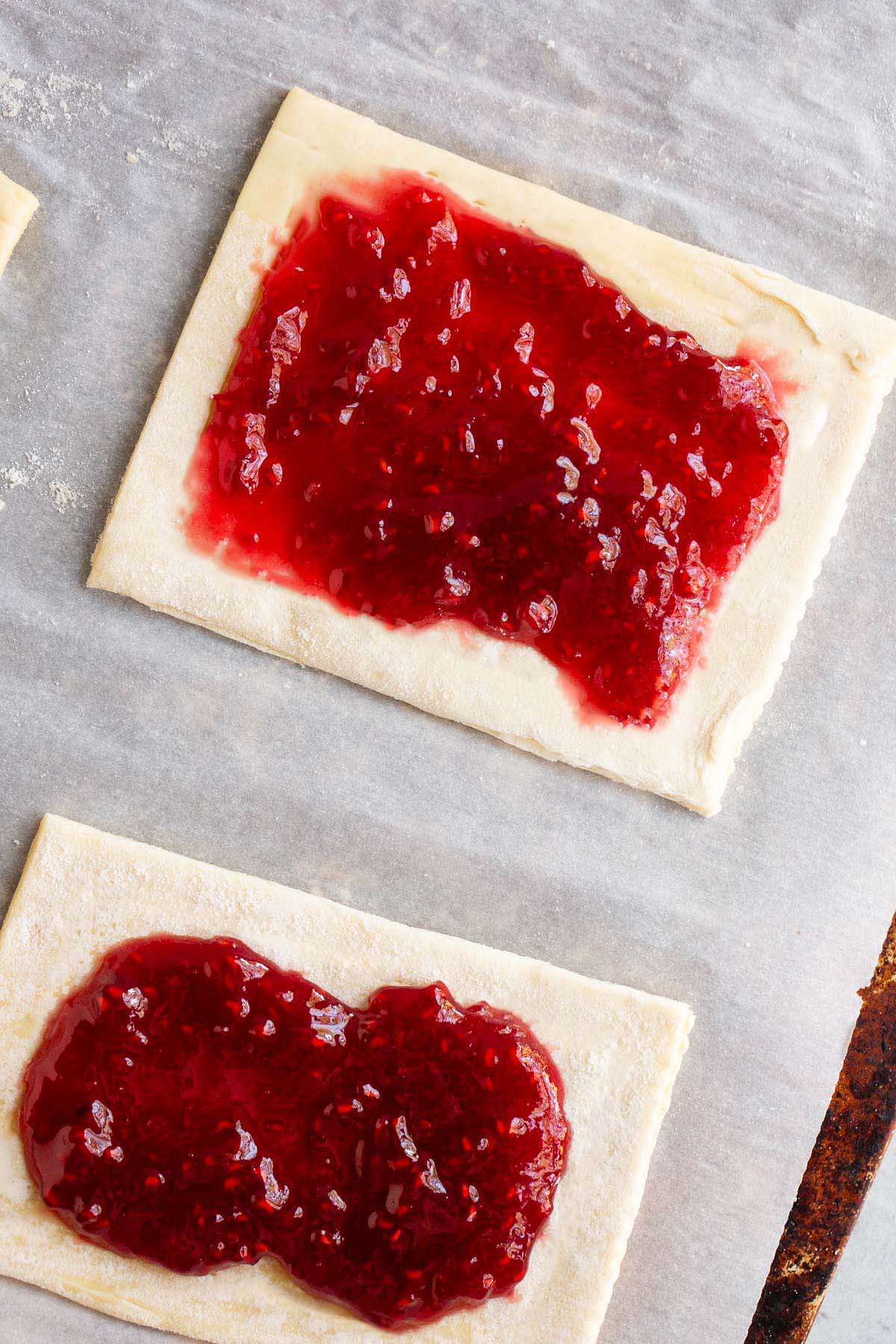 Adding jam to puff pastry