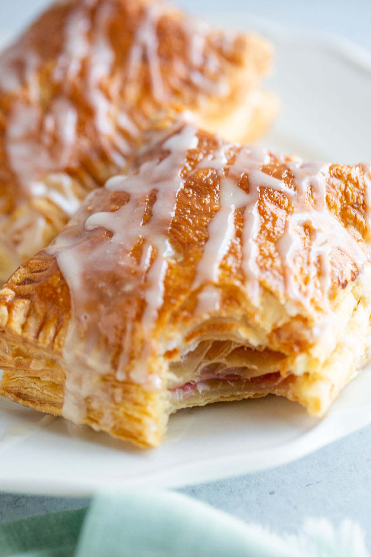 Jam filled puff pastry with a glaze
