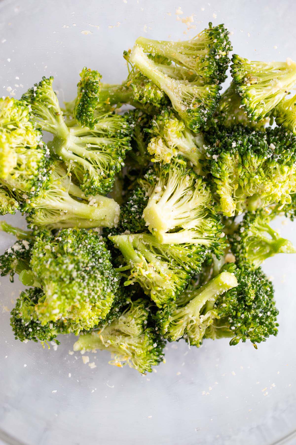 Broccoli tossed with grated parmesan.