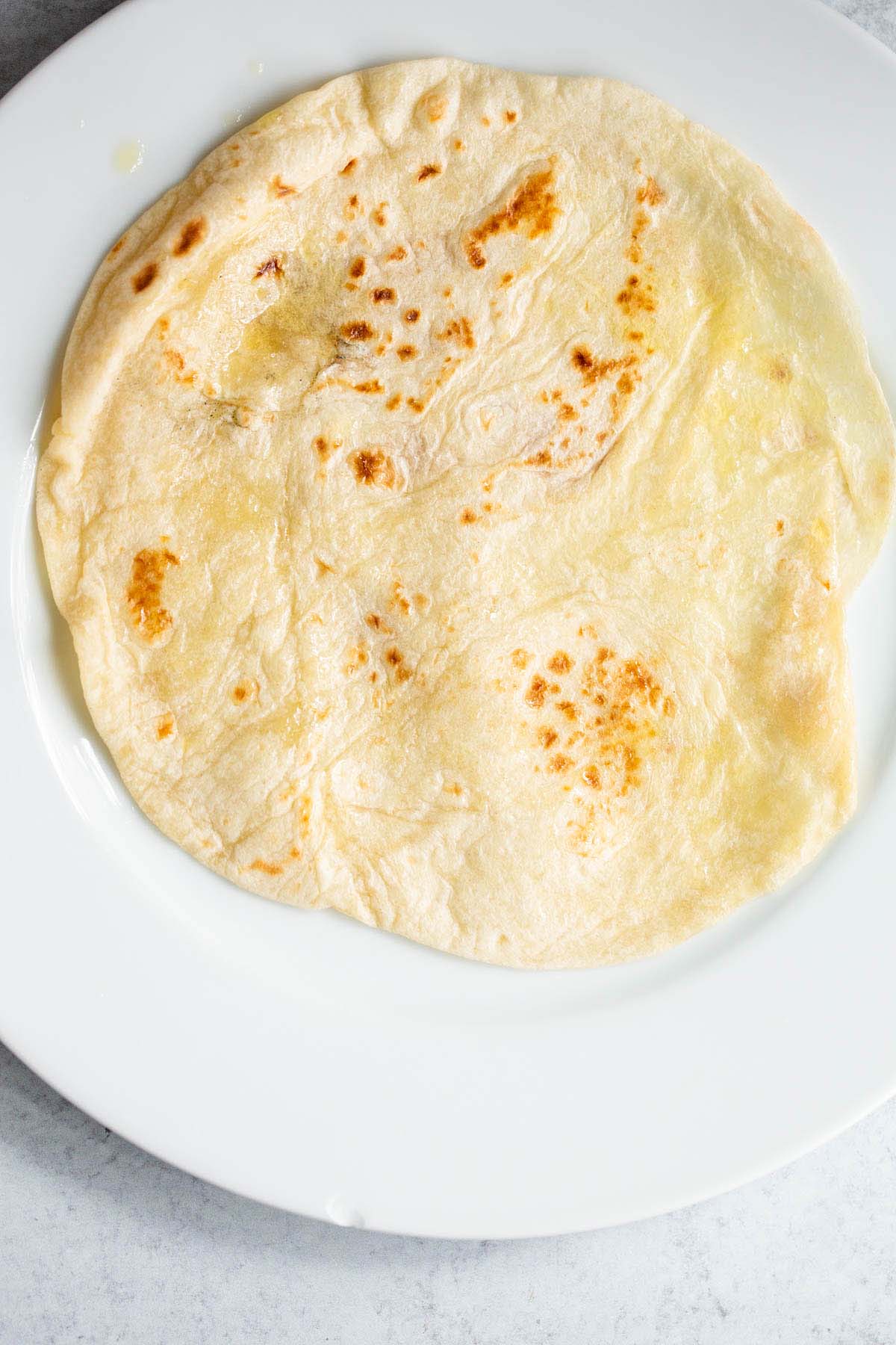 Flour tortilla on a plate.