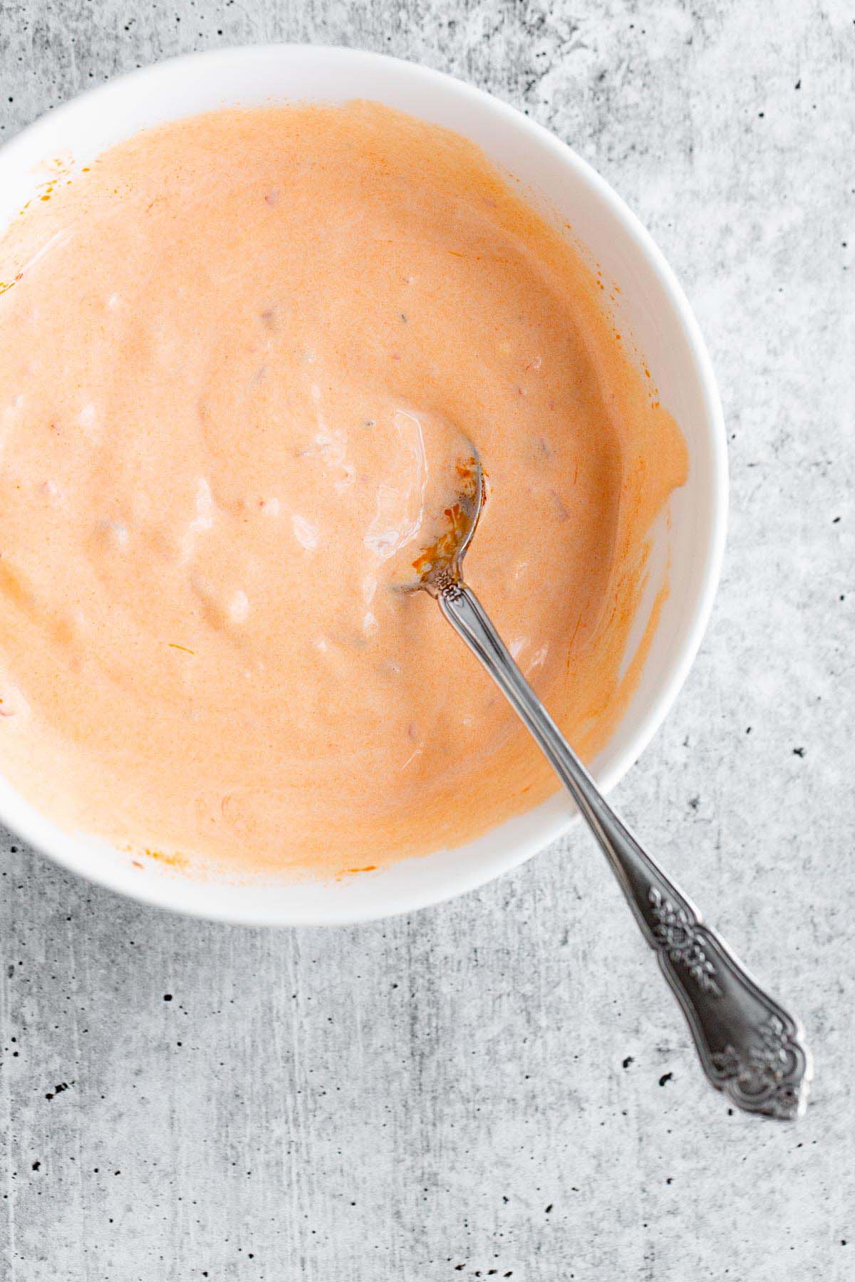 Calabrian mayo in a white bowl